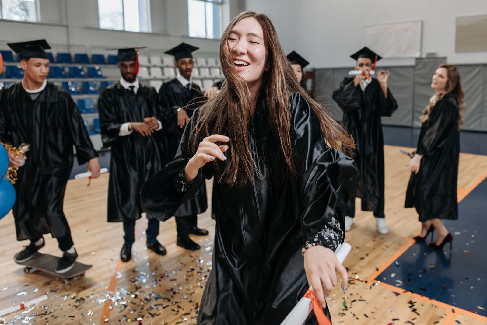 RankUp graduates celebrating their academic achievement at commencement